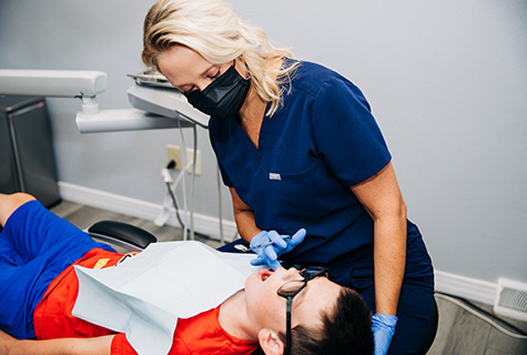 Dentist with patient